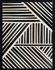 Telar: franjas negras y crema en bloques con diagonales y verticales como un tejido, cuadro con marco negro (F-063)