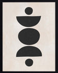 Equilibrista: círculos y medias lunas negras apilados en equilibrio sobre fondo crema, cuadro con marco negro (F-054)