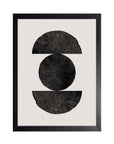 Canica: esfera negra entre dos medias lunas sobre fondo crema, cuadro con marco negro (F-029)